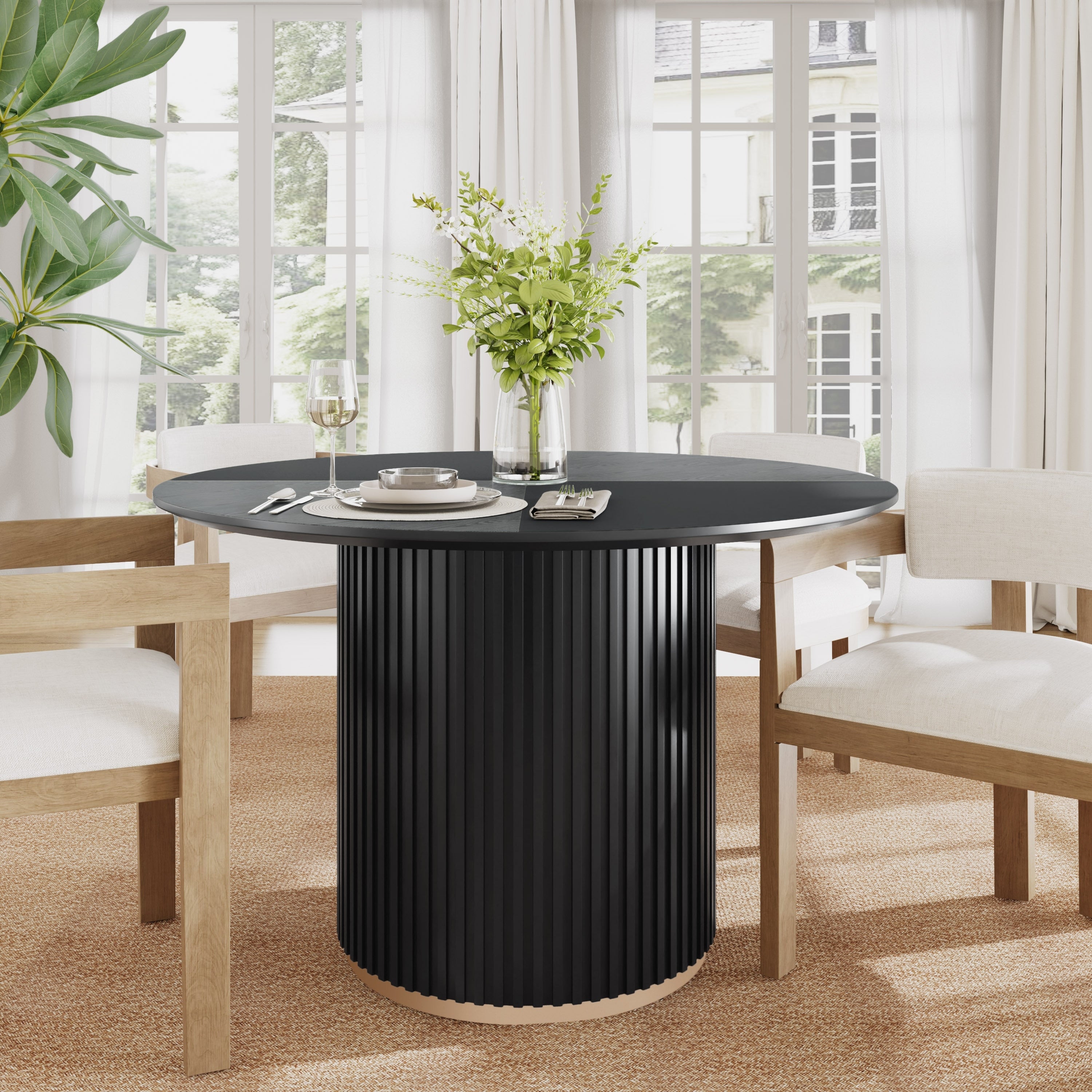 - Malcolm round Pedestal Dining Table.