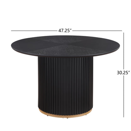 - Malcolm round Pedestal Dining Table.