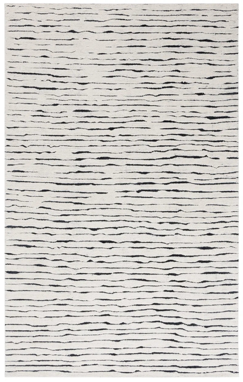 Transform Your Space with the Casablanca Hand Tufted Wool Pile Abstract Rug - 5' x 8' Elegance in White